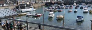 fishing boats bobbing in the harbour at Porthleven